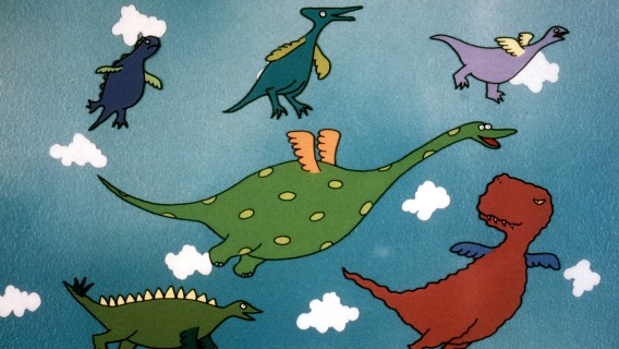 Dinosaurs of all colors with wings flying in the sky